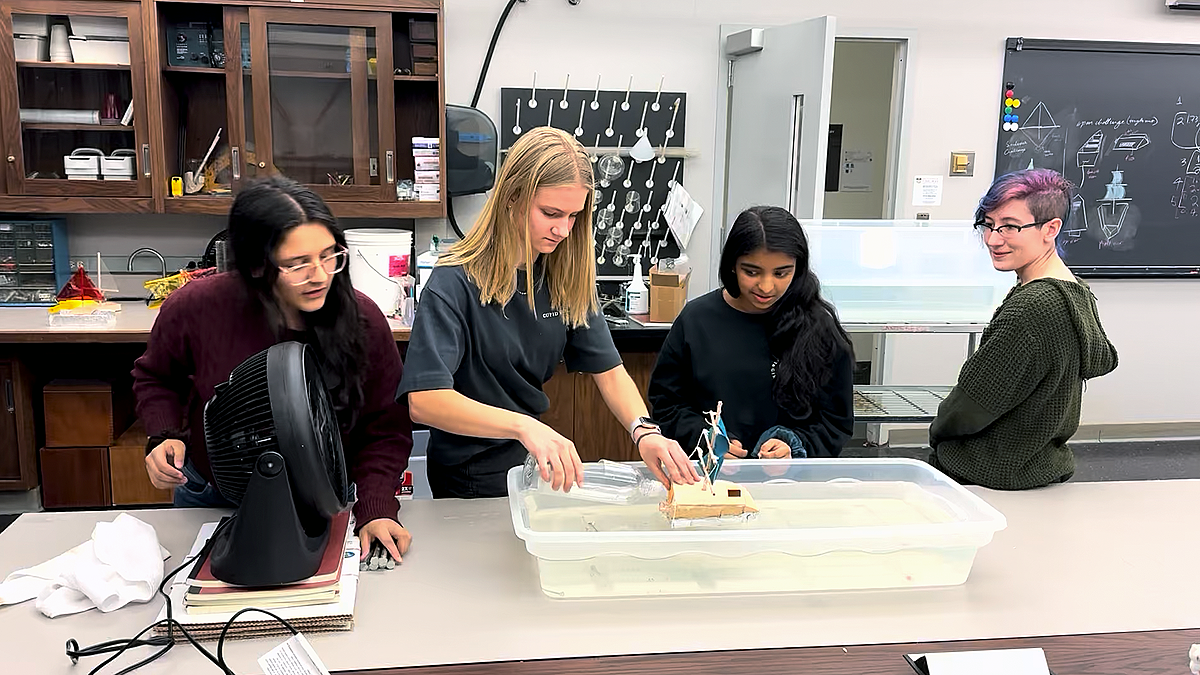 Students participating in the Space Explorers Winter Institute test sailboats they designed and built using lessons learned on buoyancy and drag. (Photos: Tyler Natoli)