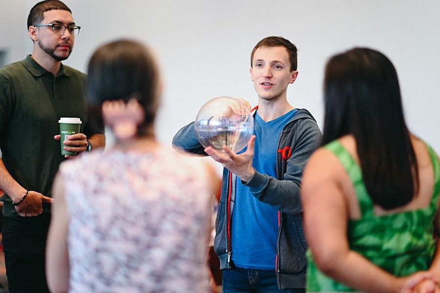 UChicago Pritzker School of Molecular Engineering Quantum Educational Laboratory Instructor Danyel Cavazos demonstrates the blorb to a group of high school teachers. (Photo by Elaina Eichorn)