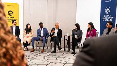 President Barack Obama speaks with last year's cohort of Obama Foundation Scholars.